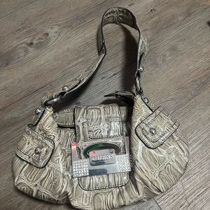 Several purses- 2 guess purses and one DKNY purse